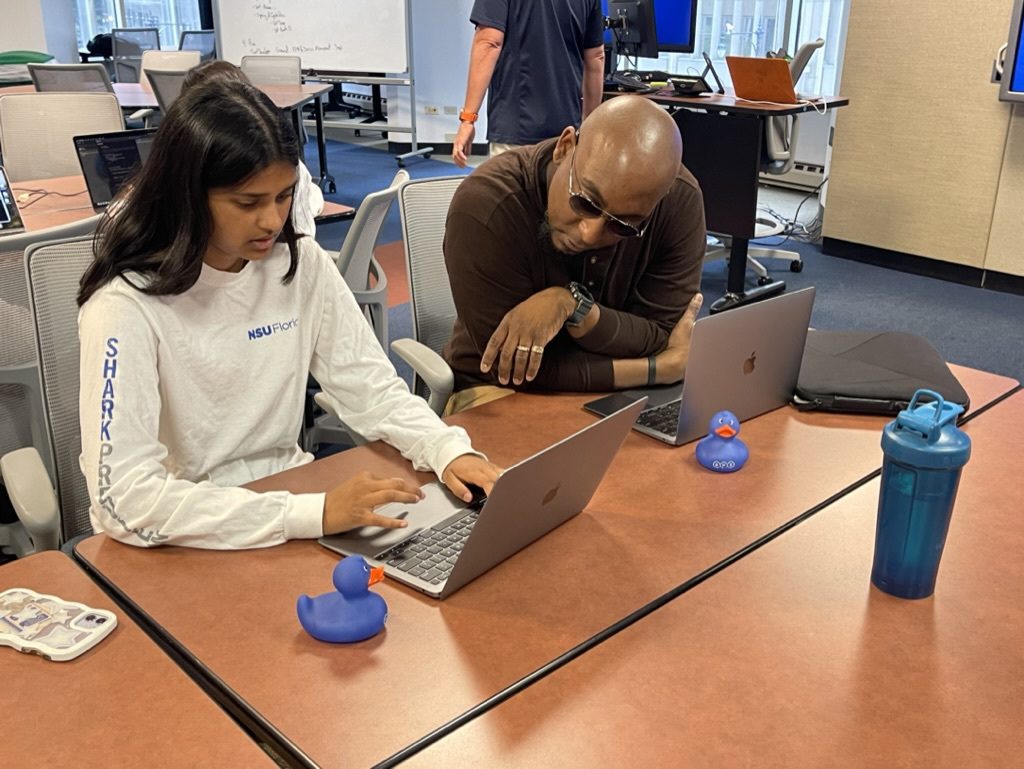 Students and teachers learned Swift mobile app development together.